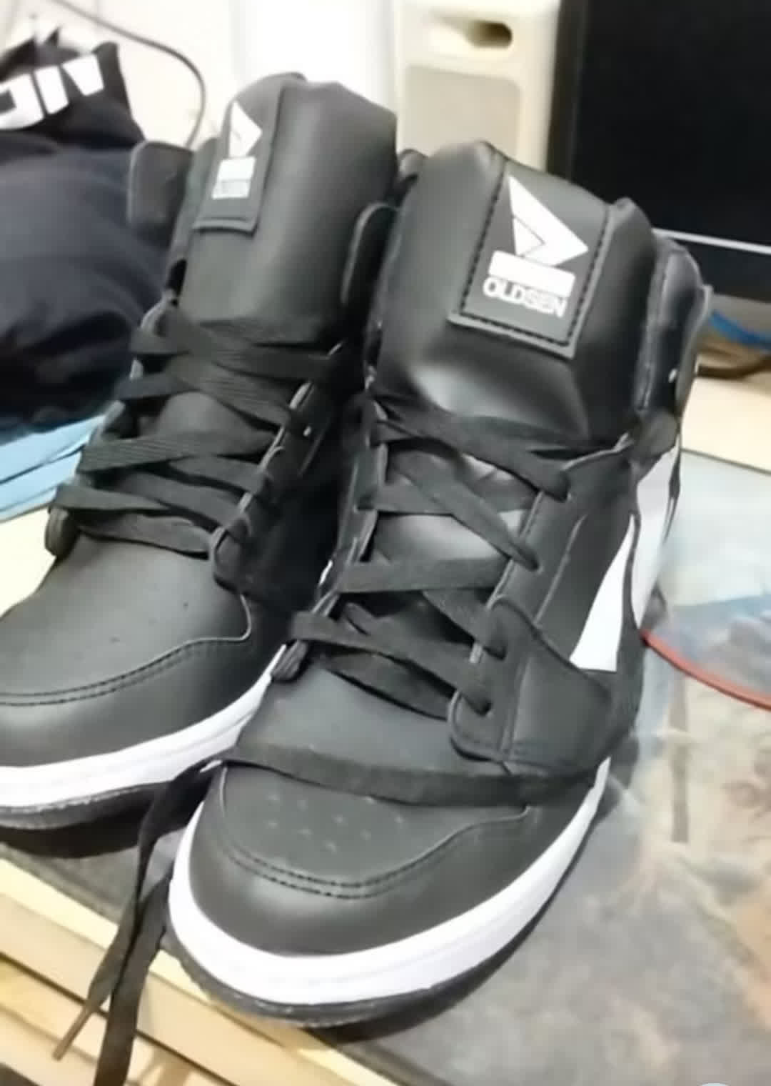 Front view a Jordan 1 bootleg in black.